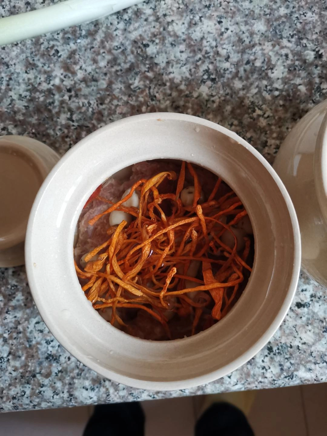 Close-up of lit. turn a pot into a wok
