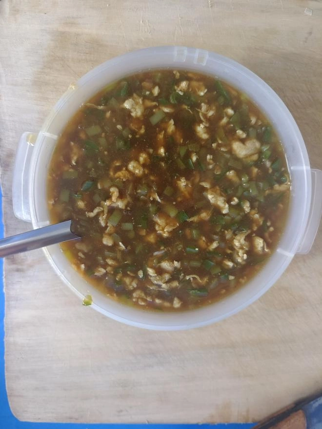 Close-up of egg marinade with chili peppers